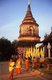 Thailand: Monks in front of the 16th century chedi at Wat Lok Moli, Chiang Mai, northern Thailand